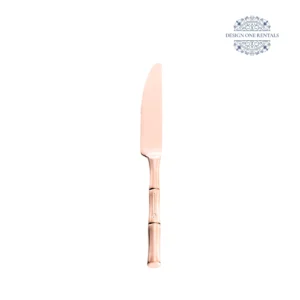 The Aurora Copper Collection Dinner Knife with white background