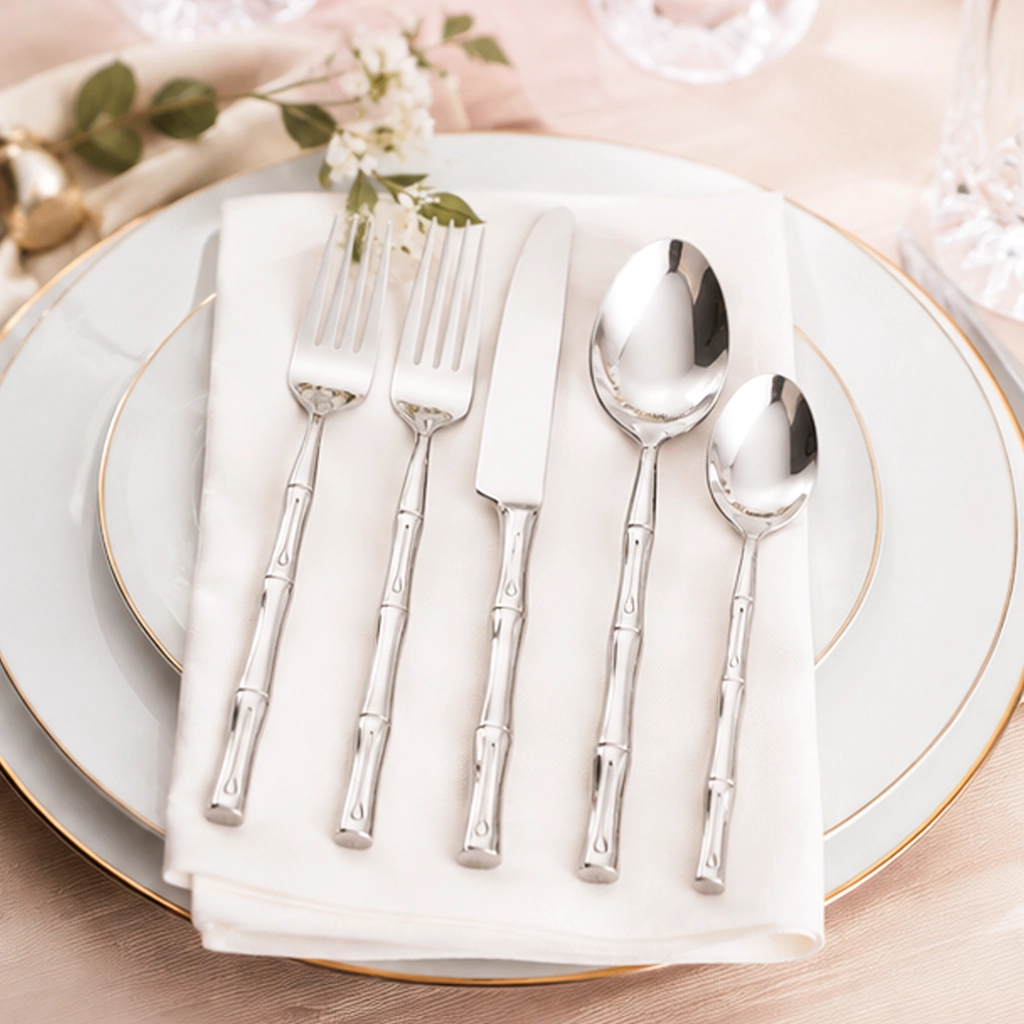 Aurora Stainless Silver Collection Flatware Set in table setting