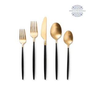 White background product image of the The Two Tone Black and Champagne Collection flatware set featuring black, gold stainless steel construction and coordinated dining pieces.