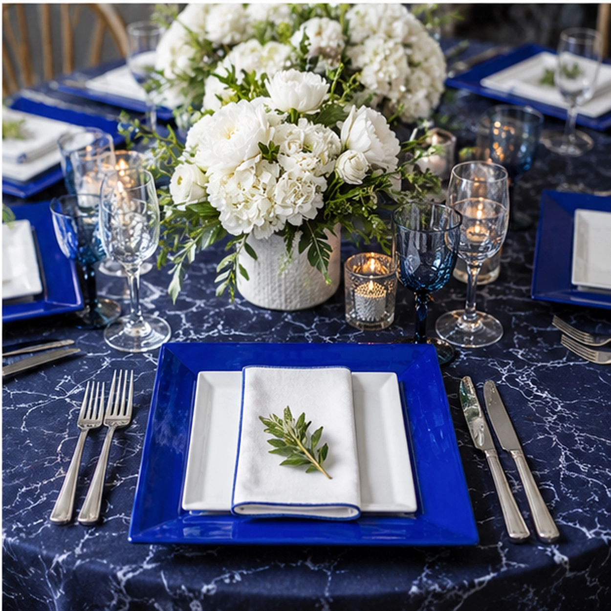 blue border charger plate in a formal event tablescape