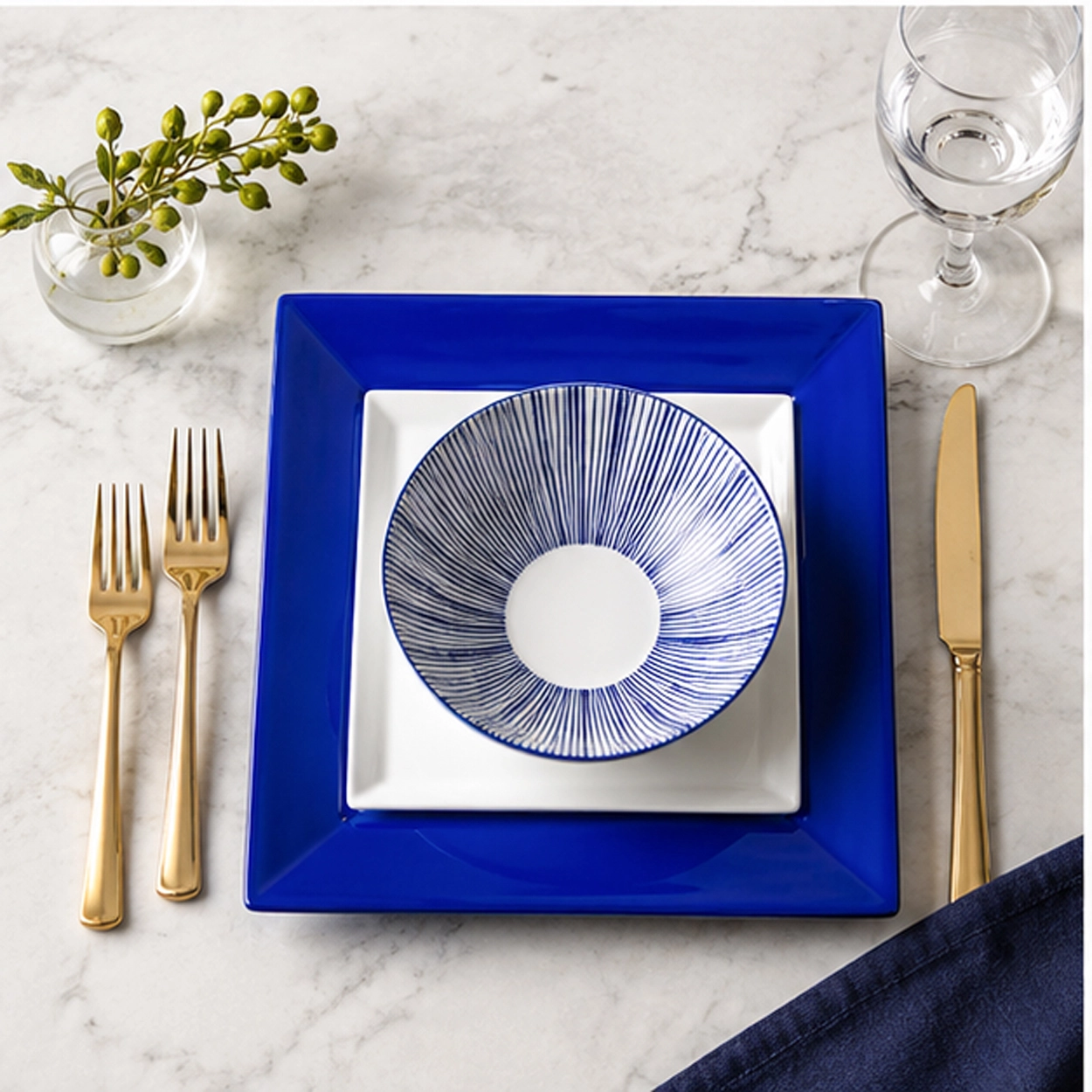 blue border charger plate in a fine dining setting