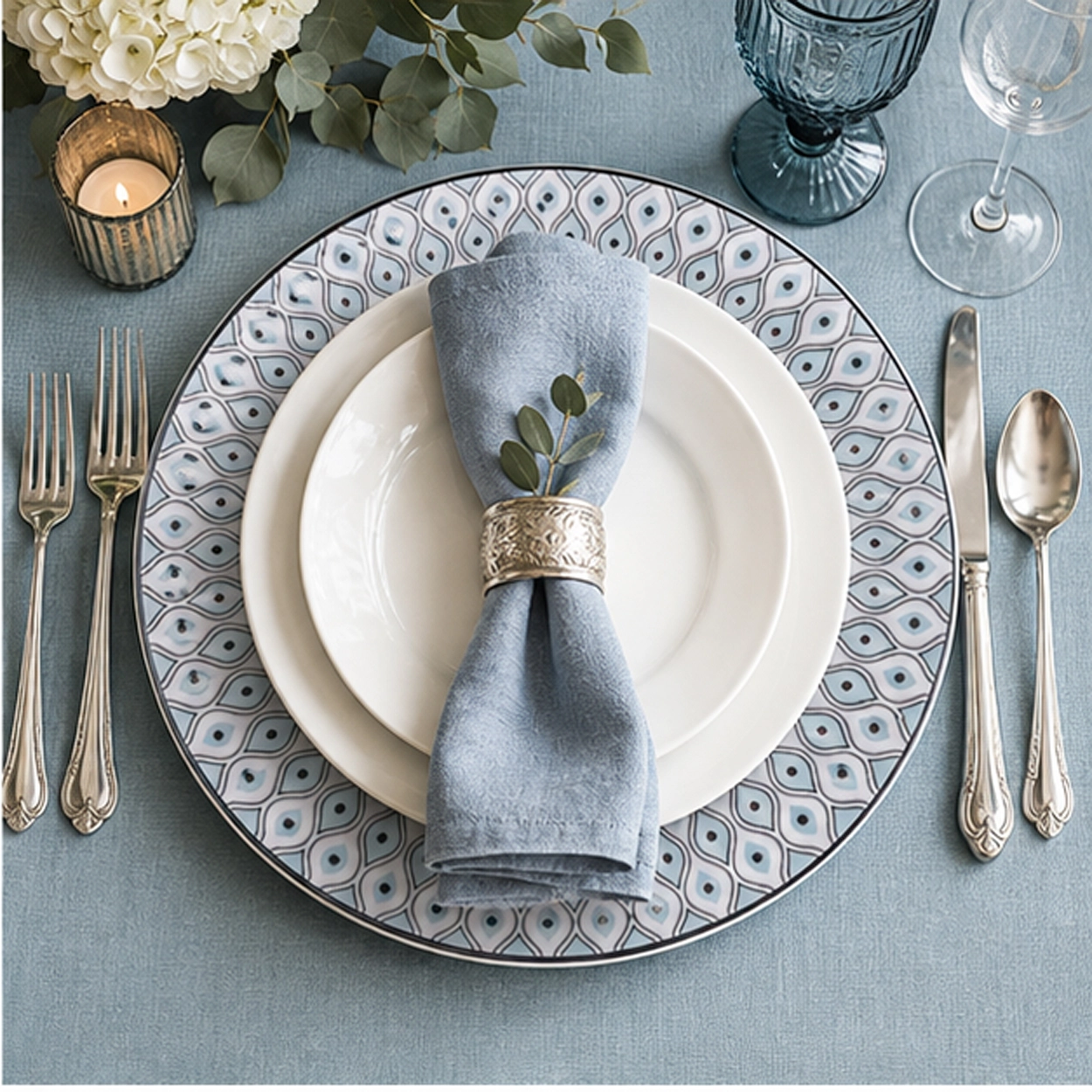 evil eye charger plate in a fine dining setting