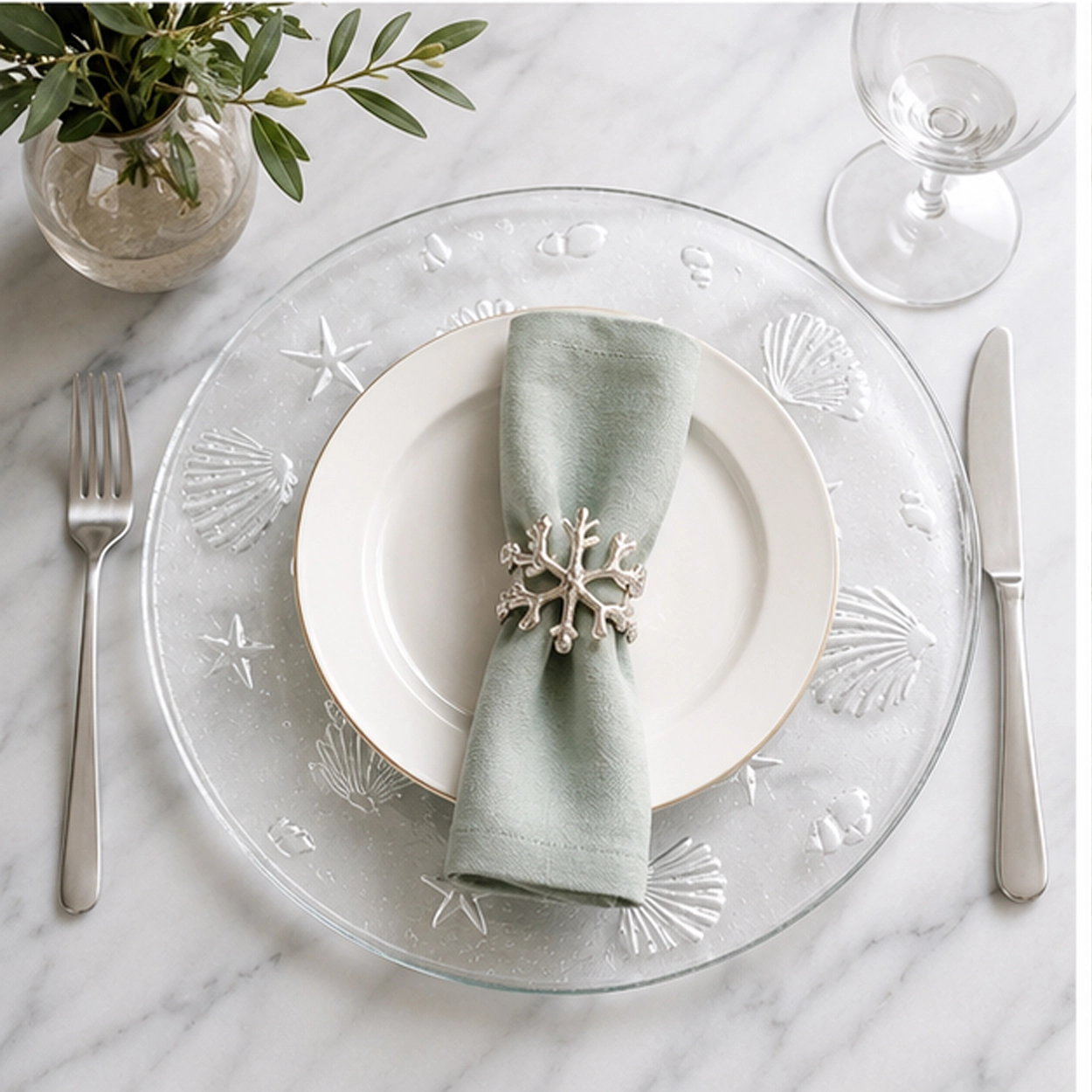 Frosted fossil charger plate in fine dining setting